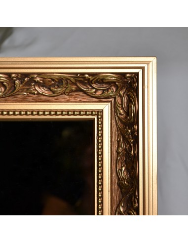 Luxuriöser Wandspiegel in ornamentiertem Rahmen...