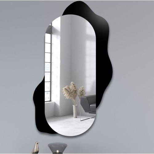 Dekorativer ovaler Spiegel auf schwarzem Fleck - KLEKS