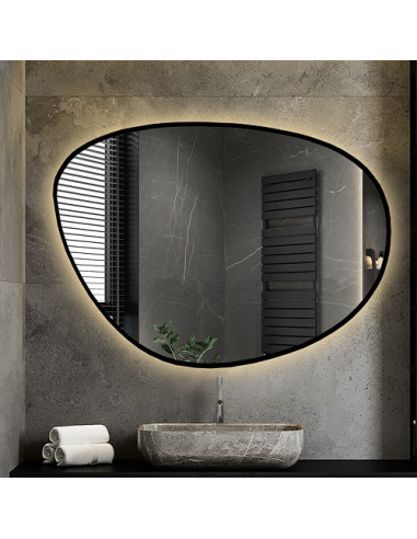 Unregelmäßig geformter Spiegel in einem Rahmen...